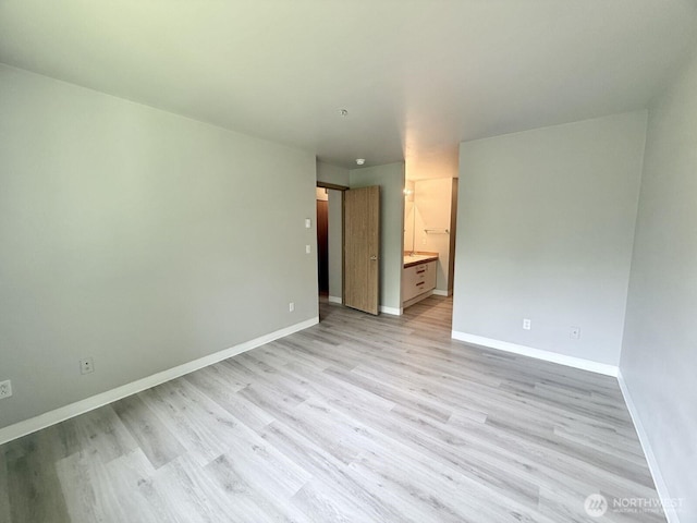 22212 42nd Ave S Unit 204, Kent, WA 98032 - spare room featuring light wood-type flooring