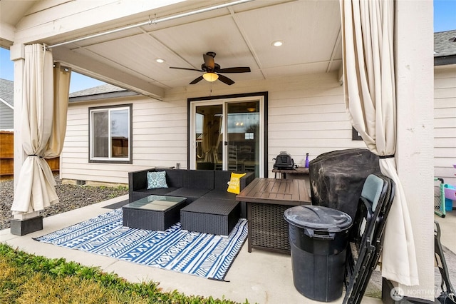 view of patio featuring outdoor lounge area and ceiling fan