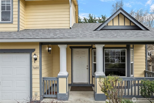 property entrance with a porch, a shingled roof, and an attached garage