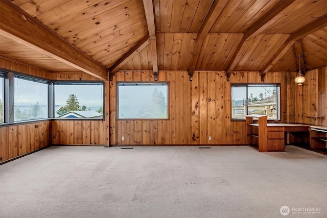 interior space featuring vaulted ceiling with beams and wood ceiling