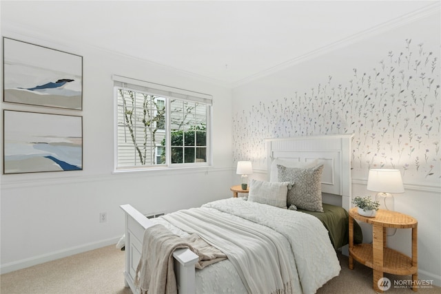 carpeted bedroom with baseboards and ornamental molding