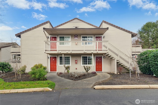 view of front of house featuring stairway