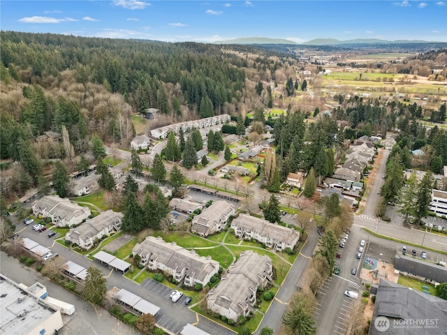 bird's eye view featuring a view of trees