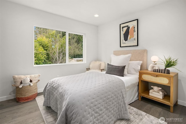 bedroom featuring recessed lighting, baseboards, and wood finished floors