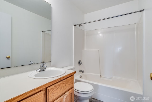 full bath with vanity, toilet, and shower / bath combination