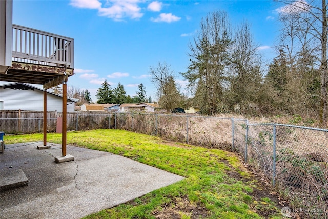 view of yard featuring a fenced backyard and a patio