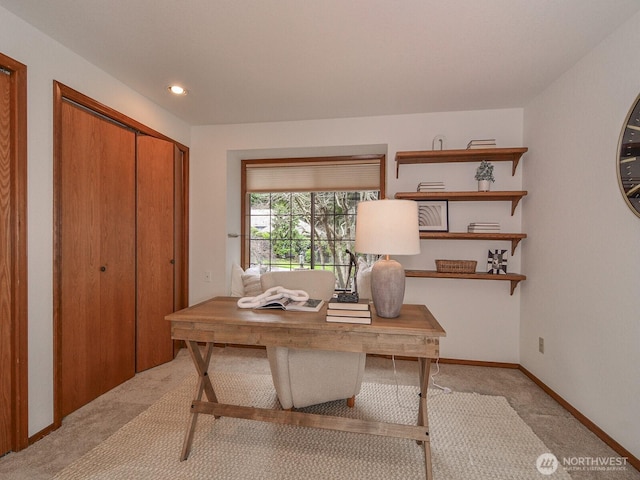 office space featuring light carpet, recessed lighting, and baseboards