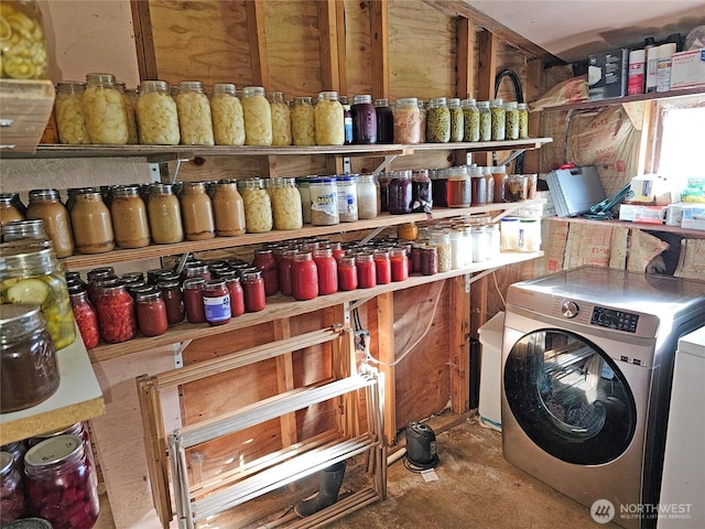 laundry room with washer / dryer and laundry area