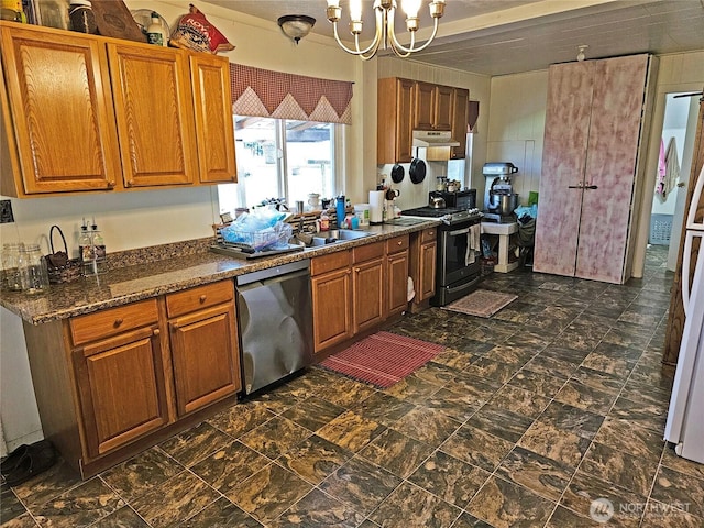 kitchen featuring appliances with stainless steel finishes, a chandelier, and brown cabinetry