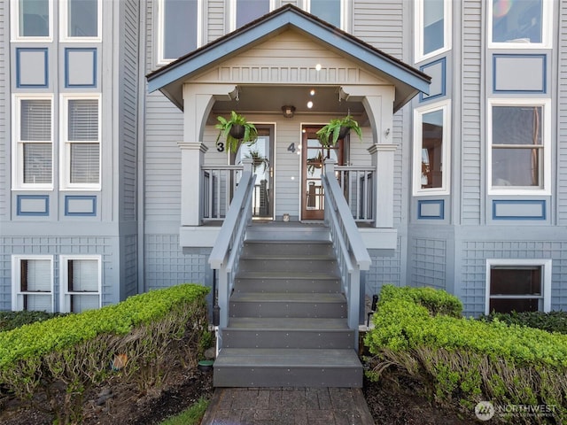 property entrance featuring a porch