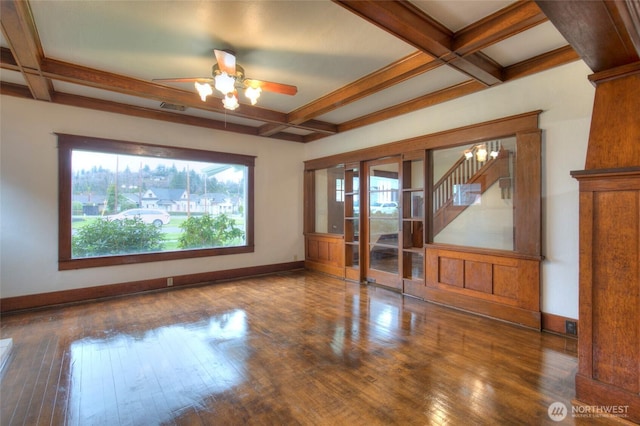 spare room with baseboards, coffered ceiling, a ceiling fan, and hardwood / wood-style flooring