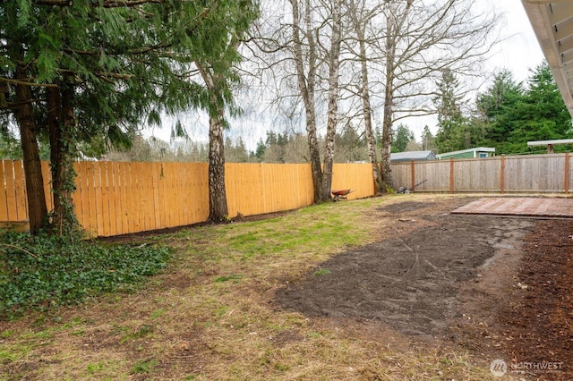 view of yard featuring a fenced backyard