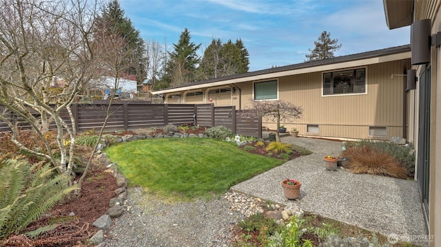 view of yard with fence