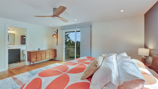 bedroom with wood finished floors, recessed lighting, ceiling fan, ensuite bathroom, and access to outside