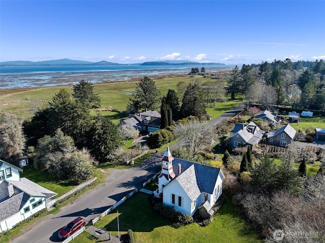 drone / aerial view featuring a mountain view