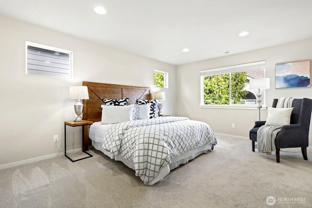 carpeted bedroom with recessed lighting, visible vents, and baseboards