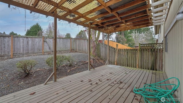 deck with a fenced backyard