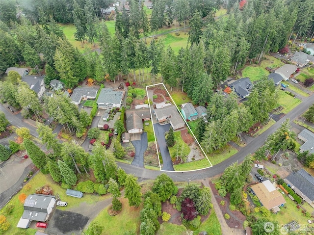 birds eye view of property with a residential view