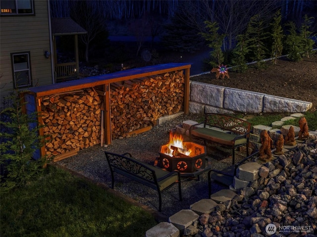 view of patio featuring a fire pit