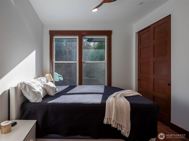 bedroom featuring dark wood-type flooring