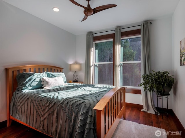 bedroom featuring recessed lighting, wood finished floors, baseboards, and ceiling fan