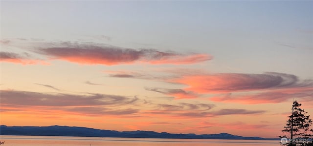 property view of mountains featuring a water view