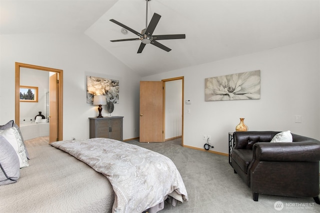 carpeted bedroom with baseboards, a ceiling fan, ensuite bathroom, and lofted ceiling