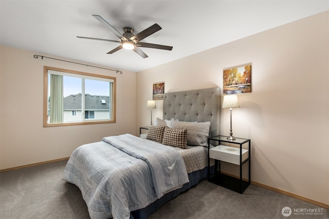 bedroom with carpet flooring, baseboards, and ceiling fan