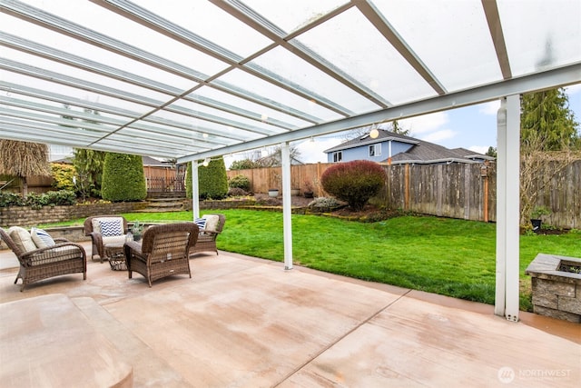 view of patio / terrace featuring a fenced backyard, outdoor lounge area, and a pergola