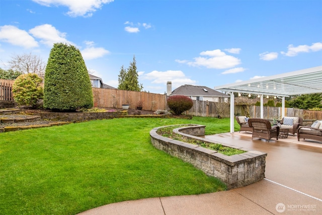 view of yard featuring an outdoor living space, a patio area, and a fenced backyard