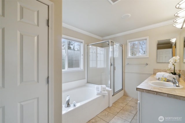 full bath with vanity, a garden tub, ornamental molding, and a shower stall