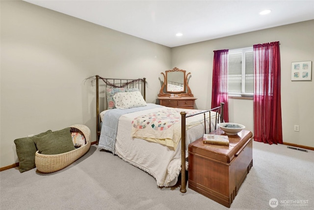 carpeted bedroom featuring visible vents, recessed lighting, and baseboards