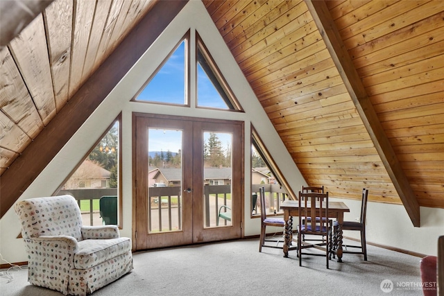 sitting room featuring wood ceiling, french doors, vaulted ceiling with beams, and carpet flooring