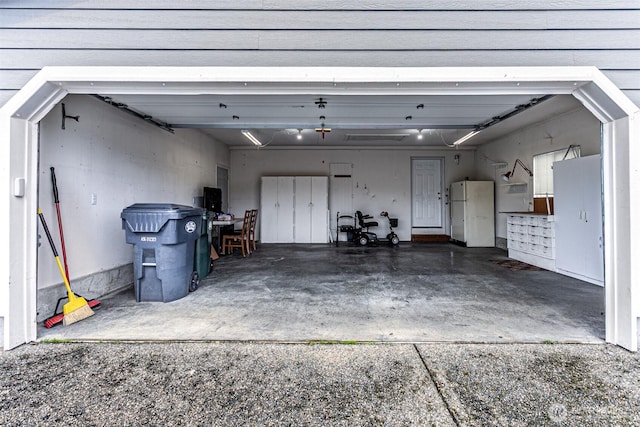 garage featuring freestanding refrigerator