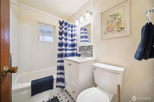 bathroom featuring decorative backsplash, vanity, toilet, and shower / bathtub combination with curtain