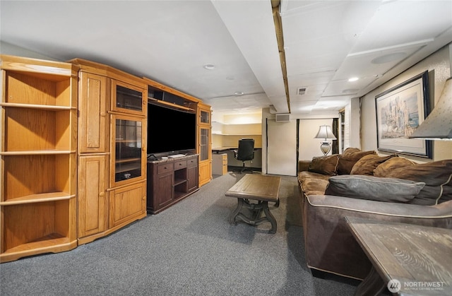 carpeted living area with visible vents