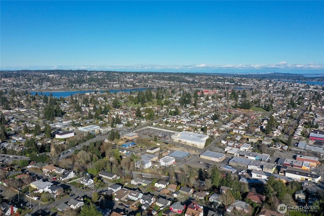 bird's eye view with a water view and a residential view