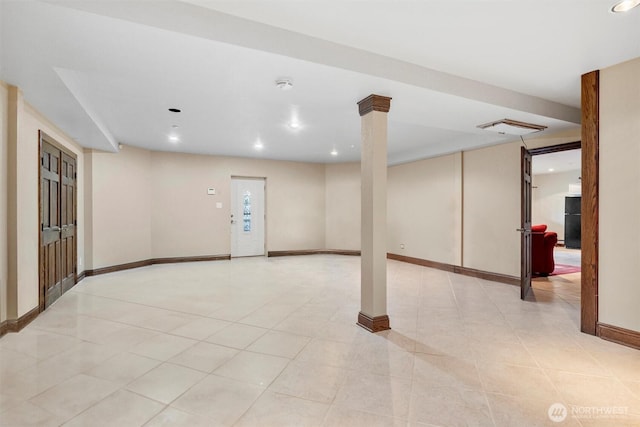 basement featuring refrigerator, light tile patterned flooring, recessed lighting, and baseboards