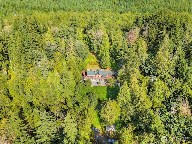 aerial view featuring a view of trees