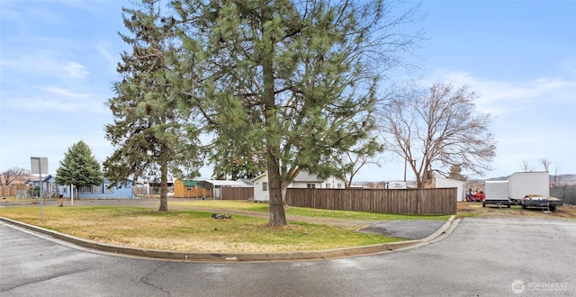 view of street featuring curbs