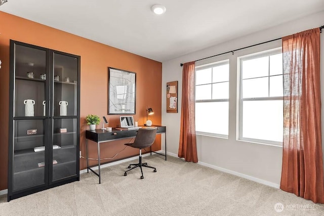 office featuring baseboards and carpet