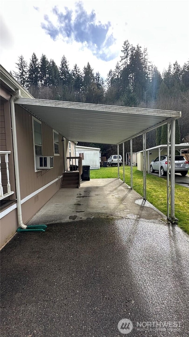 view of parking with a carport