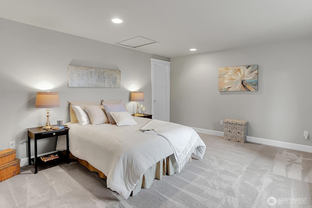 bedroom with attic access, recessed lighting, baseboards, and light carpet