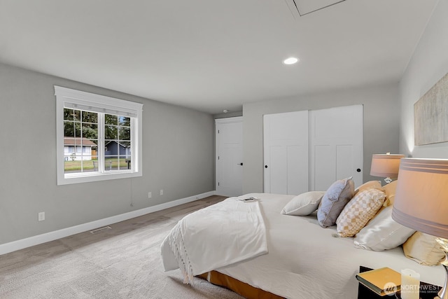 bedroom featuring recessed lighting, carpet flooring, visible vents, and baseboards