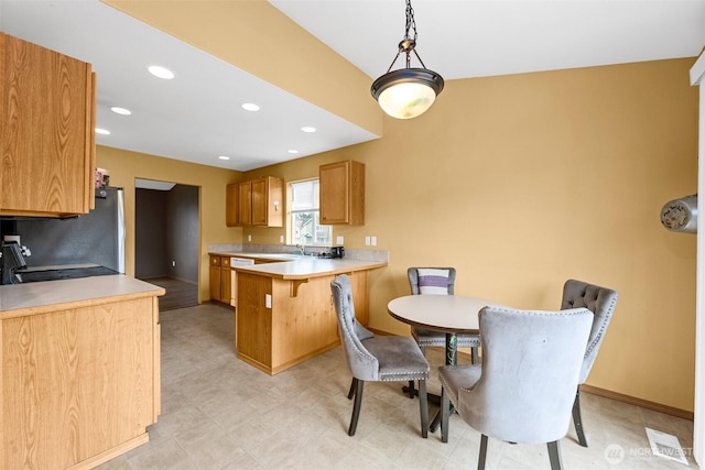 dining room featuring recessed lighting, visible vents, baseboards, and light floors