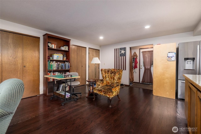 living area featuring recessed lighting and wood finished floors