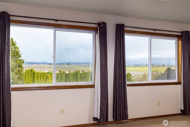 spare room featuring a rural view