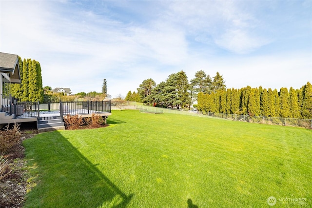 view of yard featuring a wooden deck