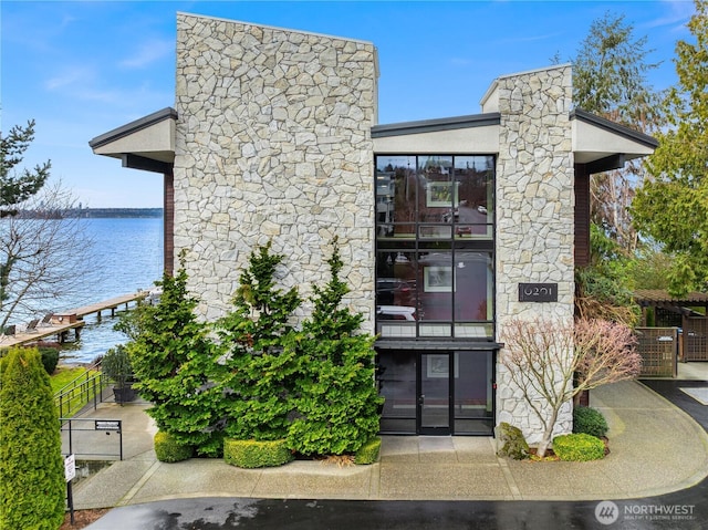 view of building exterior featuring a water view