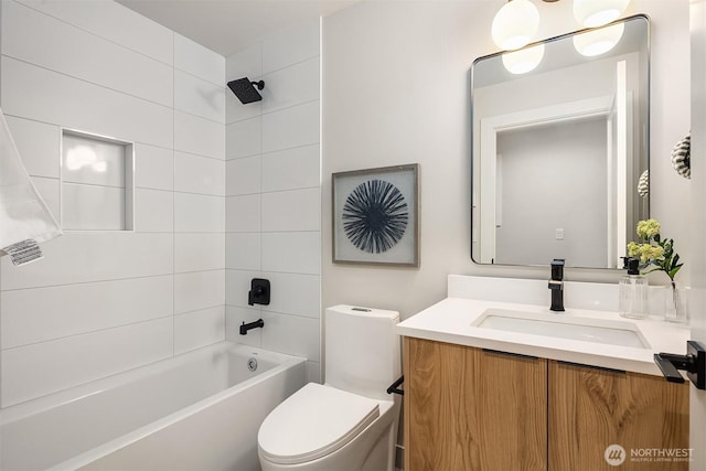 full bathroom featuring vanity, shower / bathing tub combination, and toilet